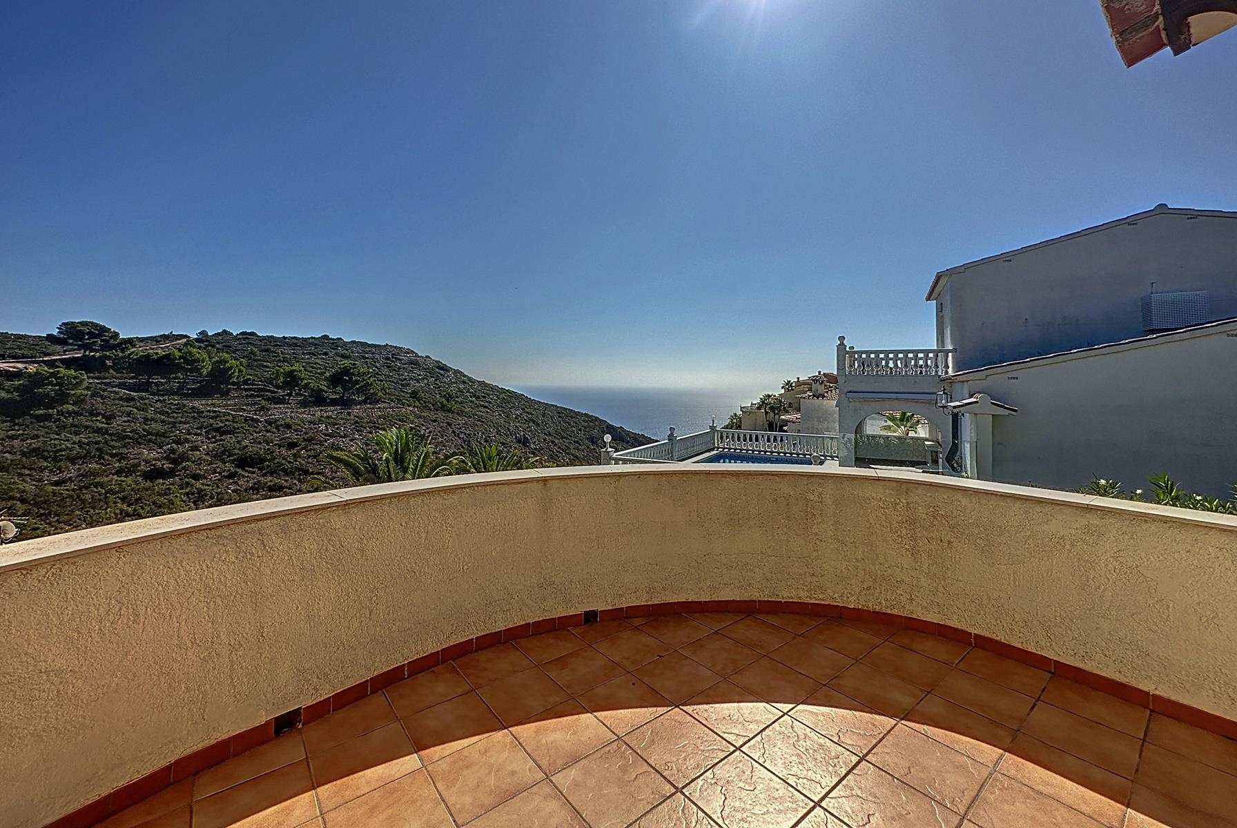 Villa with communal pool and sea views